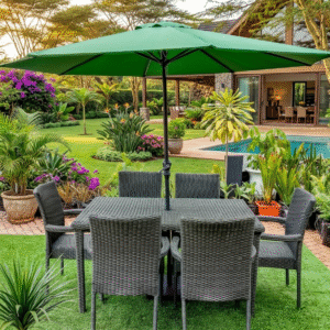 A 6-seater green rattan garden dining set with a central green umbrella on artificial turf, next to a luxury pool and a tropical-themed garden patio.
